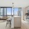 Expansive two-bedroom apartment at The Leaf offering stunning natural light through floor-to-ceiling windows.