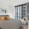 Spacious two-bedroom apartment at The Leaf with an open-concept living area and modern finishes.