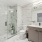 Refined two-bedroom apartment at The Leaf showcasing designer lighting, quartz countertops, and premium appliances.