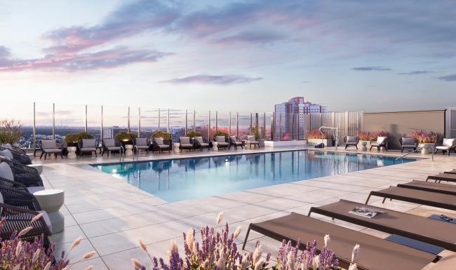 Find your perfect fit at The Leaf a pool with a city in the background