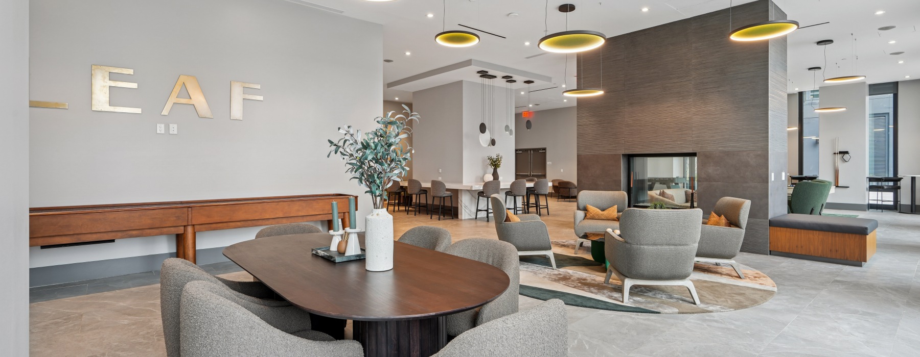 Lounge with tables and seating.